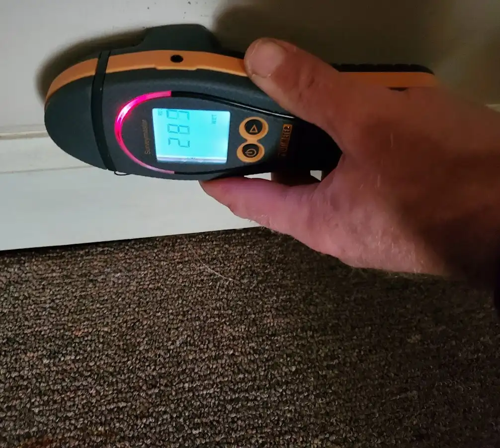 Moisture detection at baseboard during Storm Damage Restoration in Martinez